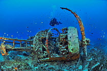 A diver on the wreck of the Bristol Blenheim bomber shot down in December 1941, Malta, Mediterranean