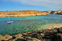 Blue Lagoon cove, a popular site for boats to visit, Comino Island, Malta, Mediterranean