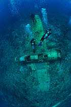 Divers around the wreck of a Japanese Fighter Seaplane, Koror, Palau, Philippines