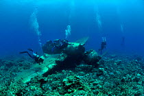 Divers around the wreck of a Japanese Fighter Seaplane, Koror, Palau, Philippines
