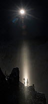 RF - Moon beam  created by reflections from ice crystals in air, at full moon over Grand Canyon, Yelllowstone National Park, Wyoming, USA. January 2016. (This image may be licensed either as rights ma...