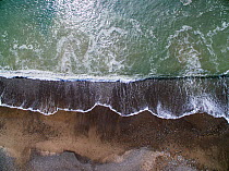 Aerial view of shoreline of shingle and sand, Hells Mouth (Porthe Neigwl), Abersoch, Wales UK April