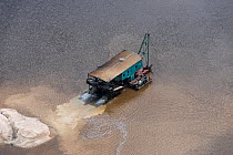 Aerial view of gold dredger in Essequibo river, Guyana South America
