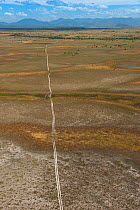 Aerial view of dirt road crossing the Rurununi savanna, Guyana, South America