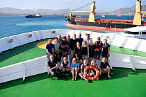 Group of scientists aboard boat cruising around Cape Verde to samplle the deep waters of the Atlantic Ocean, December 2015.