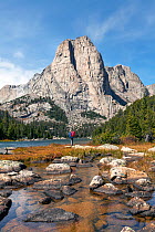 Cathedral Peak from Middle Lake, Popo Agie Wilderness, Wind River Range, Shoshone National Forest, Wyoming, USA. September 2015. Model released.