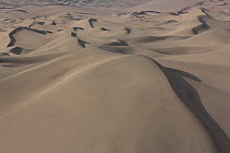 Aerial view of Nazca coastal desert with sand dunes in San Fernando National Reserve, Peru