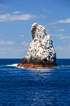 Roca Partida,  a small rock island covered in white bird guano  in the Revillagigedo Archipelago Biosphere Reserve, Socorro Islands, Western Mexico