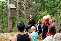 Artist Astri Tonooian and daughter, present 'Unsatiable' to the public. Valer, Ostfold County, Norway. September 2014.