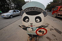 Giant panda road side sign  at Chengdu Panda Breeding Center, Sichuan. China, January 2012.