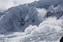 Avalanche rolling down mountain, Llaca glacier surrounding Cordillera Blanca Mountain Range, Andes, Huscaran National Park, Peru