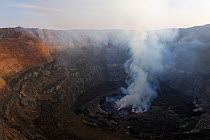Steam rising from active lava lake in the crater of Nyiragongo Volcano, Virunga National Park, North Kivu Province, Democratic Republic of Congo, Africa