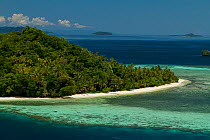 Island and village of Friwen, just off Gam Island, West Papua. Indonesia.