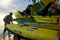 Pilot Max Ammer with his ultralight float plane.  Kri Island, Raja Ampat Islands, Indonesia.