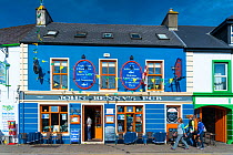 Blue painted pub facade in Dingle village, Dingle Peninsula, County Kerry, Republic of Ireland. September 2015.