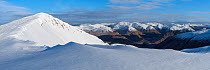 Cornice from the summit of Ben Starav overlooking Glen Coe. Glen Etive, Highlands of Scotland, UK, January 2016.