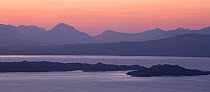View from Isle of Skye across Sound of Raasay to Rona and Torridon Hills, at dawn, Inner Hebrides, Scotland, UK, April 2014.
