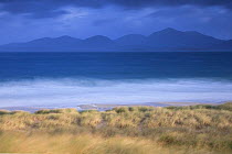 View across Sound of Taransay to North Harris hills in stormy weather , West Harris, Outer Hebrides, Scotland, UK, September 2014.