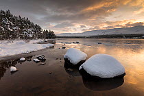 Loch Morlich with wintry view to Cairngorm, Glenmore, Cairngorms National Park, Scotland, UK, December 2014.
