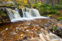 Waterfall in autumn, Glenfeshie, Cairngorms National Park, Scotland, UK, October 2015.