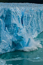 Ice calving from Perito Moreno Glacier, Los Glaciares National Park, Santa Cruz, Patagonia, Argentina. February 2010.