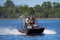 Airboat used by tourists for leisure activities; this type of vessel, because of its shallow draft, can get into areas that other boats can't, however it is extremely noisy and disturbs wildlife, espe...