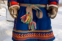 Nenets man's traditional decorated malitsa (reindeer skin parka). Yamal, Western Siberia, Russia