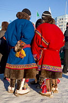 Nenets people in traditional costumes at reindeer herders' festival at Nadym. Yamal, Western Siberia, Russia