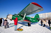 An old Antonov II biplane, one of the attractions at the reindeer herders' festival at Nadym. Yamal, Western Siberia, Russia