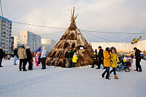 Nenets reindeer skin tent erected in the centre of Nadym as part of the reindeer herders' festival. Yamal, Western Siberia, Russia