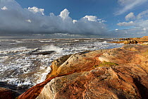 Hilbre Point also known as Red Rocks at high tide looking out across the mouth of the River Dee Estuary towards Hilbre Island and North Wales, Hoylake, Wirral, UK, January