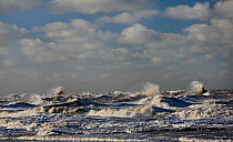 Stormy sea looking west across Liverpool Bay from New Brighton beach, Wirral Merseyside, UK, January.