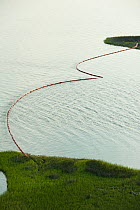 Aerial view of oil containment booms protecting Queen Bess Island, Grande Isle, Louisiana, Gulf of Mexico, USA, August 2010