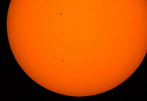 Transit of Mercury in front of the sun as seen from Denver, Colorado at 07:09 on 9 May 2016 Mercury is the dot in the lower portion of the sun, all other dots are sun spots.