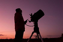 Glyn Pritchard with Meade telescope, Dark Sky, Forestry Commission, Scotland, UK, January.