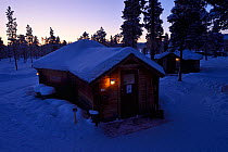 The Reindeer Lodge at dusk in mid winter colours in -39 degrees C, run by Nutti Sami Siida, near the Icehotel, in Jukkasjarvi, Lapland, Laponia, Norrbotten county, Sweden