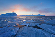 First midnight sun in late winter at Isfjorden, Spitsbergen, Svalbard, Norway, April Taken on the day of the first midnight sun of the year.