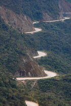 Andean highway snaking way through hills inside Tapichalaca Reserve, Province Zamora-Chinchipe, Ecuador