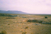 Landscape of Turkmenistan, with cave of the Blind loach (Nemacheilus starostini), Turkmenistan, 1990. Small repro only.