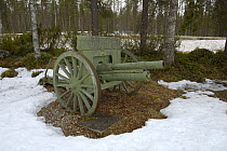 Old canon on display outdoors in snow, Museum Raatteetie, Finland