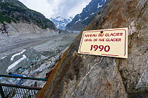 Sign showing where limit of 'Mer de Glace' (Sea of Ice) glacier used to be in 1990, Chamonix, Mont-Blanc, French Alps, Haute-Savoie, France