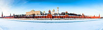 The Kremlin Palace along the Moscow river, frozen in winter,  Moscow, Russia, January 2016 Panoramic stitched of 27 images.