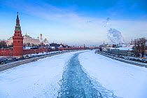 The Moskva river, iced over in winter, Kremlin on the left, Moscow, Russia, January 2016