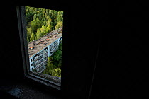 View out of a window on to Pripyat, Chernobyl Exlusion Zone, Ukraine September