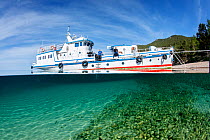 Liveaboard dive boat 'Valeria', anchored at coast of Lake Baikal, Siberia, Russia.