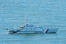 UK Border Force vessel Valiant. English Channel off Dover Cliffs, Kent, UK, August.