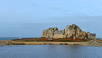 Small house in the rocks, Plougrescant, Cotes d'Armor, Brittany, France December
