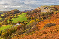Looking west from the Panorama walk on the Offa's Dyke path on Ruabon Mountain near LLangollen with Castell Dinas Bran at the top of the hill centre left and the Eglwyseg limestone escarpment on the r...