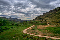 Winding road leading through the Sani Pass. Drakensberg Mountains from South Africa to Lesotho. November 2009