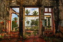 Looking out at the ocean from the inside of a building destroyed during the civil war; Mossuril, Mozambique.